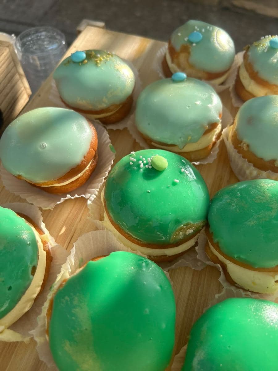 Close-up of donuts with mint-toned glaze