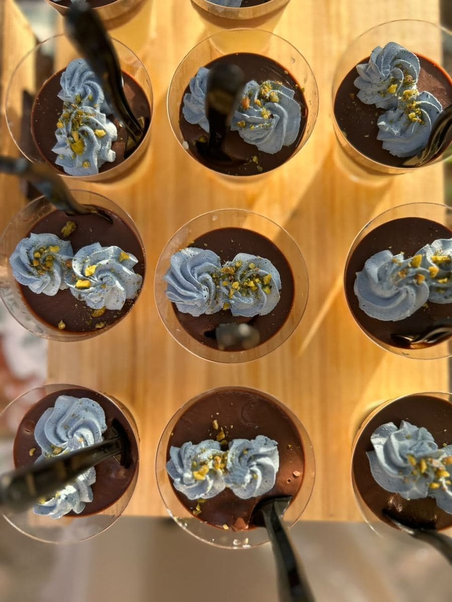 Individual chocolate mousse cups seen from above